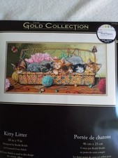 Stickpackung mit Kätzchen im Korb