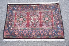 C21L23- Teppich signiert Maße 75x115 cm Gewicht: 2,6 kg