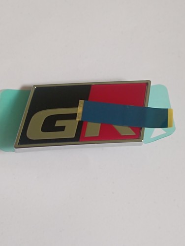Toyota corolla front emblem - front,