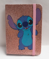 Mini Notizbuch 80 Seiten liniert Glitzereinband Gummiverschluss - STITCH