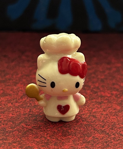 Hello kitty als köchin mit - hello,