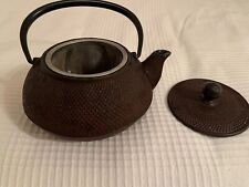 Gusseiserne Teekanne in der