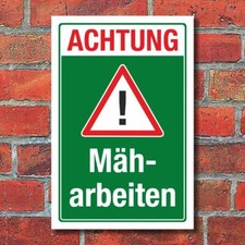 Schild Achtung Mäharbeiten