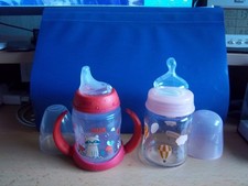 1 NUK Trinklernflasche 150ml gebraucht + Babylove Glastrinkflasche 120ml Neu