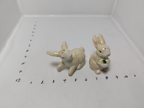 Salt and pepper shakers - and,