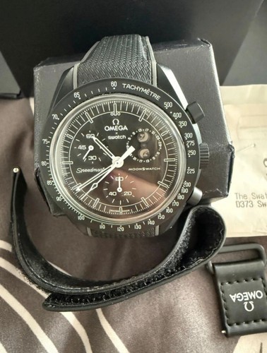 Swatch omega - x,