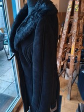 Lammfellmantel gewachsen