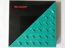 SHARP WIN-30 Design Solarzellen Taschenrechner mit Beschreibung