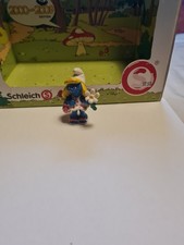 Schlümpfe Schlumpf - Schlumpfine mit Blume