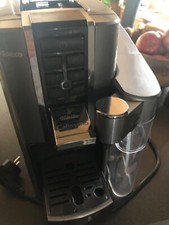 Saeco Cafissimo Silver mit Kaffeekapseln und Halter