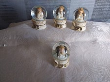 Vier Schneekugeln "Engel"