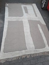 Handgewebter Wollteppich von