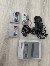 Super Nitendo Konsole + Spiele (Die Schlümpfe, Super Mario World) - VB