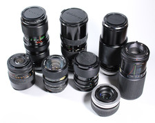 Konvolut mit 7 Objektiven für Canon FD, defekt für Bastler