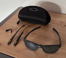 Oakley Sportbrille mit Wechselbügeln grau schwarz-gelb Gleitsicht