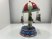 Blechspielzeug Karussell 13,5 cm x 7,5 cm Zustand siehe Fotos (ein Passagier feh