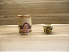 Ein Set Teedose/Keksdose und einen  Kerzenständer mit Engelmotiv von Raphaello
