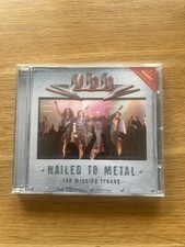 Nailed to metal - to,