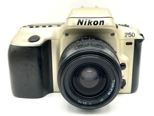 Nikon F50 + Tokina 35-70mm