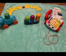 2 Fisher Price Motorikspielsachen ( Auto roll on u.Arche Noah) Telefon s.Anzeige