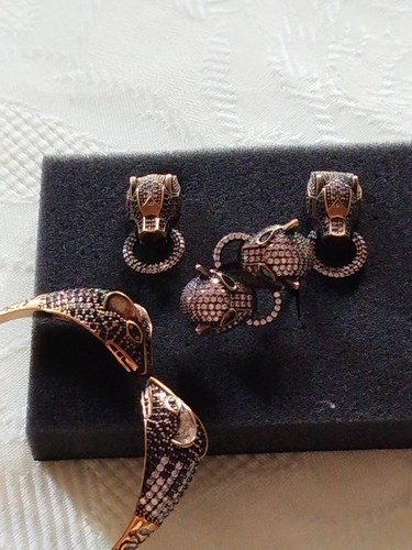 Set aus ring armreif ohrringe - set,