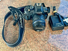 Olympus E-450 + 14-42mm