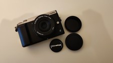 Panasonic Lumix GX80 + Olympus