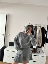 Zara grauer Strickrock Falten