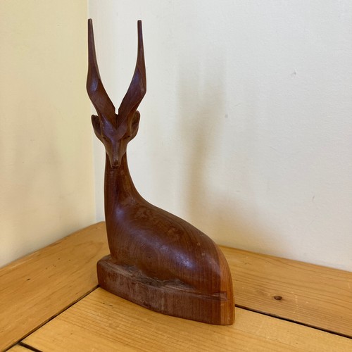 Wood impala laying down carved - wood,