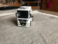 Herpa MAN TGX XXL Zugmaschine weiß gesuppert