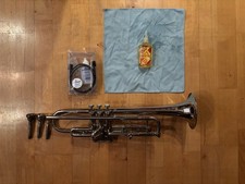 Silberne Trompetete der Marke