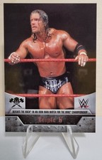 2016 Topps WWE Triple H Tribute #14 Defeats The Rock for the WWE Championship
