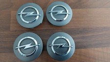 4 x Original Opel Rad Nabenkappen / Felgen Deckel Emblem grau
