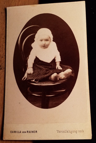 Sitting little child - little,