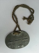 WH Erkennungsmarke an Kordel: StammKp. Inf. Nachr. E. u. A. Btl. 112