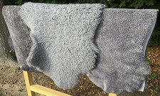 Merino Lammfell Schaffell Fell Teppich Grau kurz & gelockt 2. Wahl 100-140cm