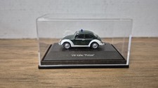 Schuco VW Käfer 1200 Polizei dkl. grün in OVP 1:87