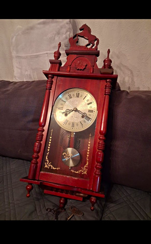 Mechanische wanduhr day - 31,