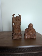 2 asiatische Holzfiguren, 12 nund 18 cm hoch