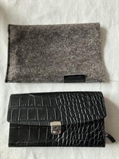 Kellnerbörse Volker Lang, Modell Schilling 