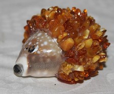 Reiseandenken - schöne Deko Figur - Muschel Igel mit Bernstein