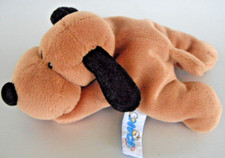 Nici Hund liegend mit Kugelfüllung u.alten Logo