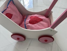 HABA Puppenwagen Herzen wie neu mit Zubehör Kissen und Decke
