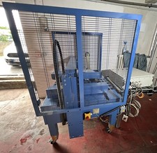 Kartonverschlussmaschine Klebemaschine +Auto- Umreifungsmaschine  Strapex SMT359