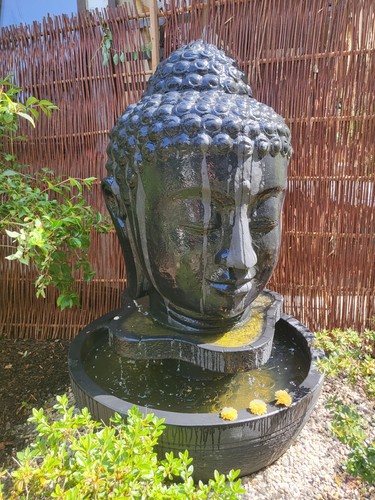 Buddhakopf als springbrunnen - als,