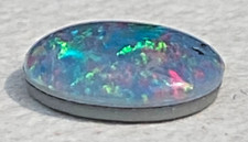 Opal Dublette 1,8 ct Australien ca. 9,9x8 mm rot grün blau gold  Schmuckstein