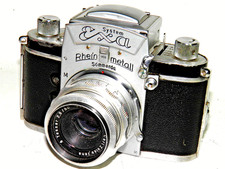 FOTOAPPARAT EXA RHEIN METAL SÖMMERDA MIT OBJEKTIV CARL ZEISS TESSAR FUNKTION 1 A