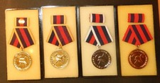 4 DDR Medaillen für treue