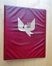 Philswiss Ringbuchordner, Motiv: Brieftaube in goldfarbenem Druck.