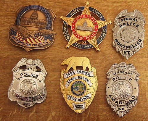 Obsolete police badges - obsolete,
